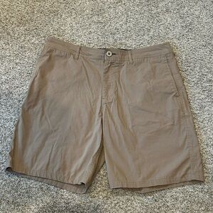 Dakota Grizzly khaki shorts. 36” waist. 8” inseam. Nylon/cotton/spandex blend.